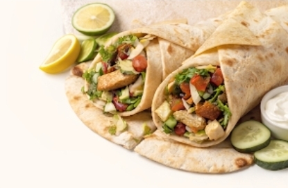 Medbox wraps filled with grilled protein, lettuce, tomato, cucumber, and sauce